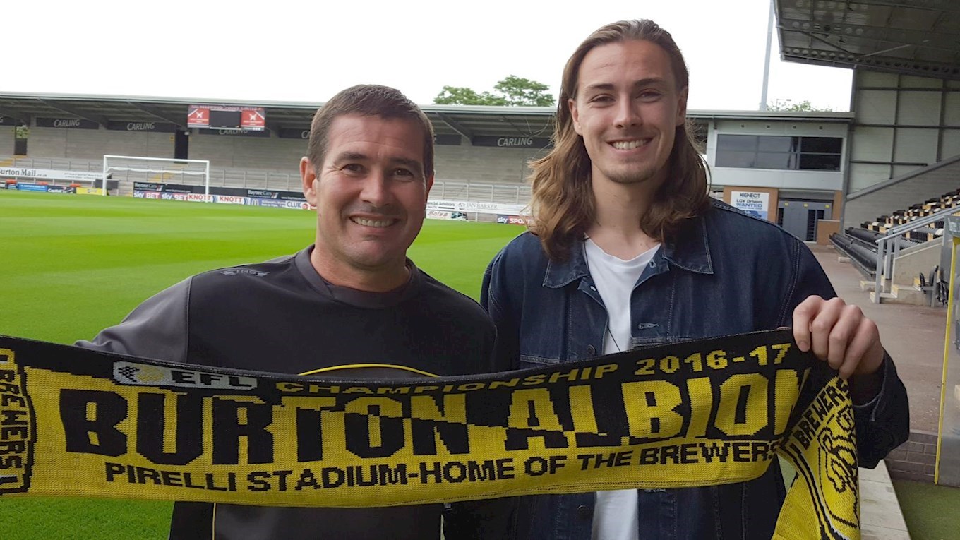 BURTON Albion manager Nigel Clough poses with club record signing Jackson Irvine after his move from Ross County