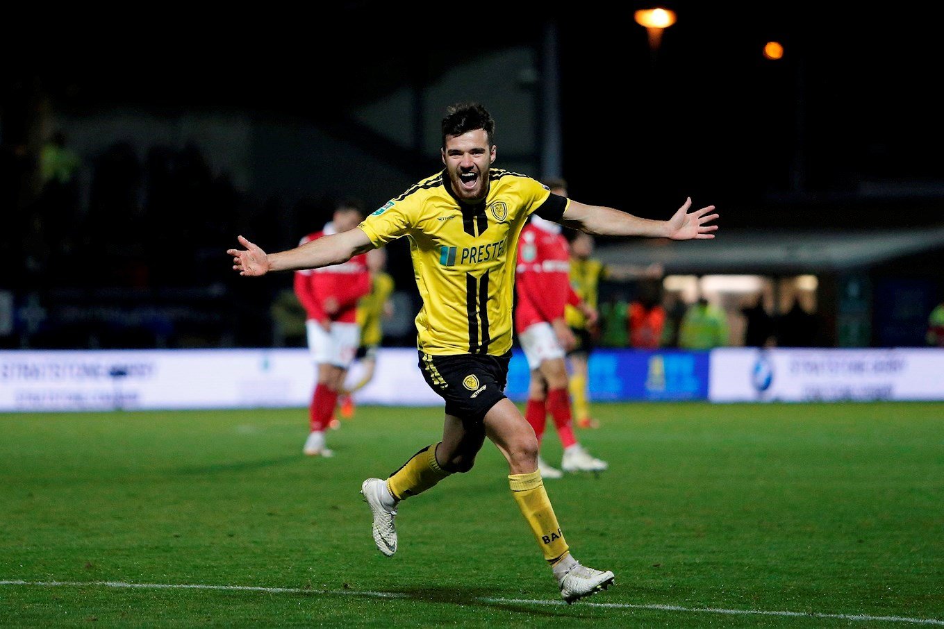 Scott Fraser celebrates his second goal in Burton Albion