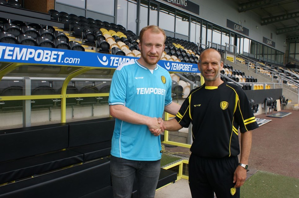 LIAM Boyce signs for Burton Albion for a club record fee - posing here with Burton Albion assistant manager Gary Crosby